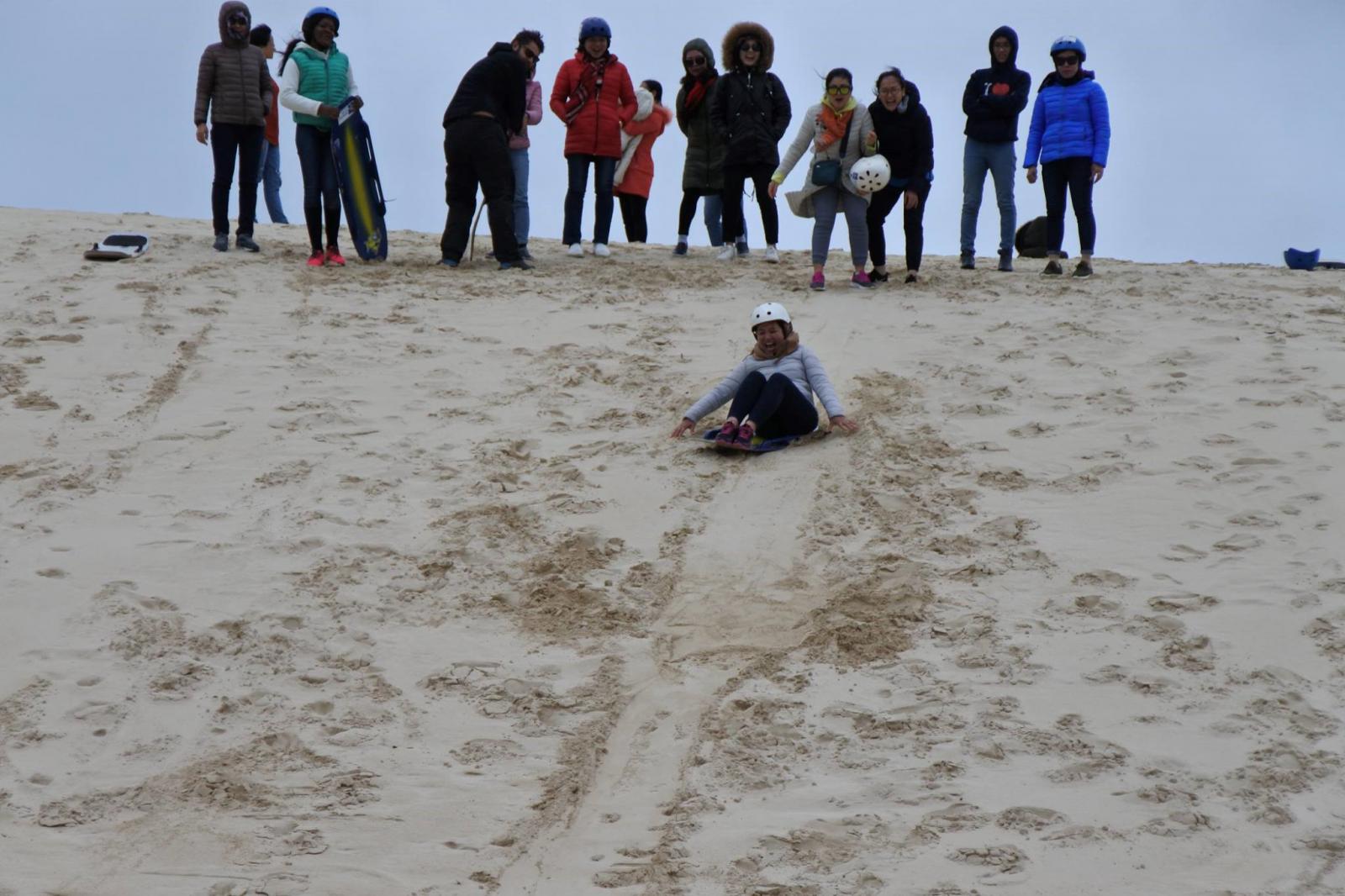 It felt “Yomost” when we slid from up high and fell rolling down the cool sand