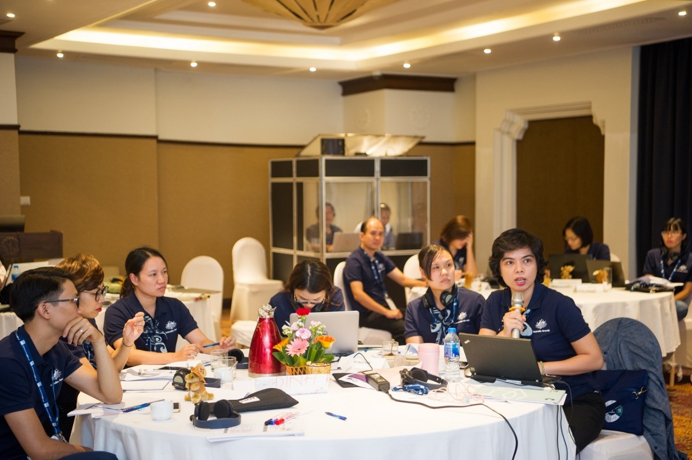 Participants actively engaging a group discussion