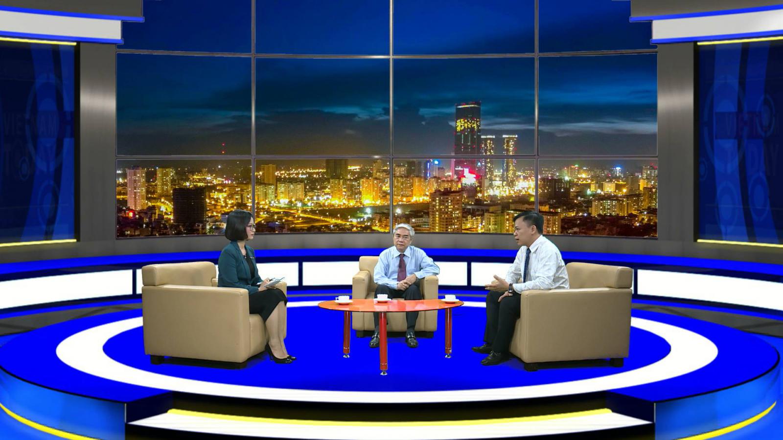 Trung in a television talk with Minister of Science and Technology, Mr. Nguyen Quan